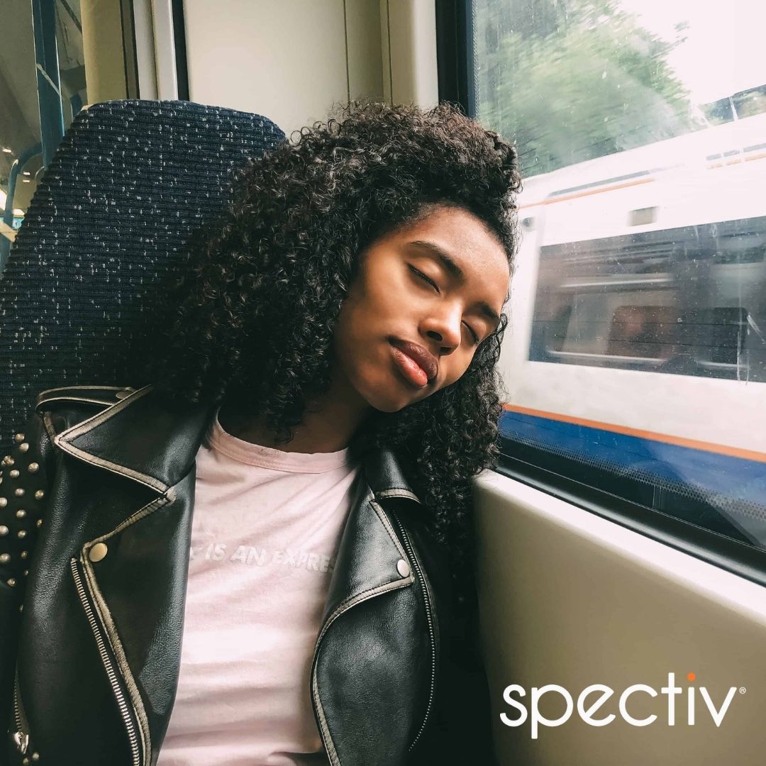 woman sleeps on a bus